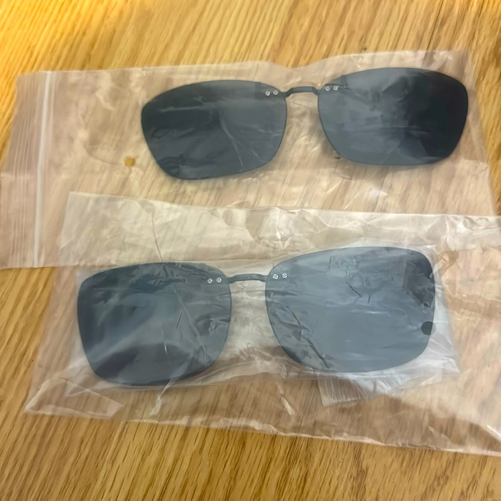 Sunglass clips over glasses
